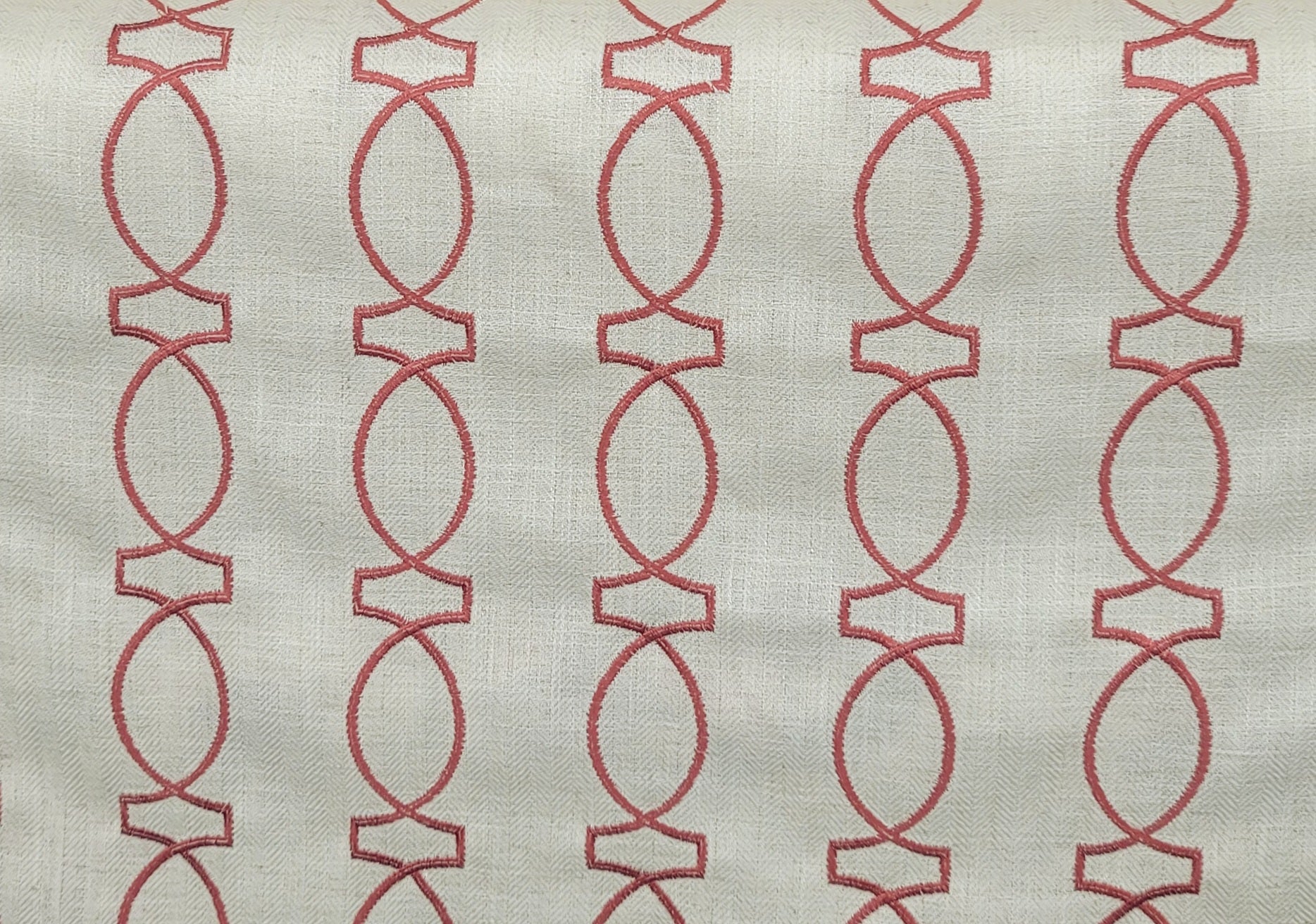 Red Geometric Embroidered Upholstery Fabric – Modern Pattern on Cream Background