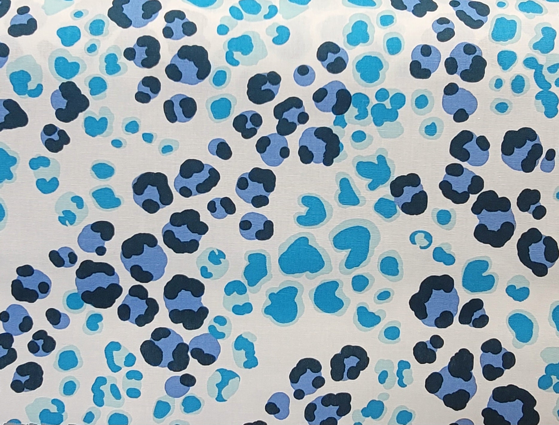 White Polyester Fabric with Blue & Navy Abstract Animal Print – Bold Modern Design